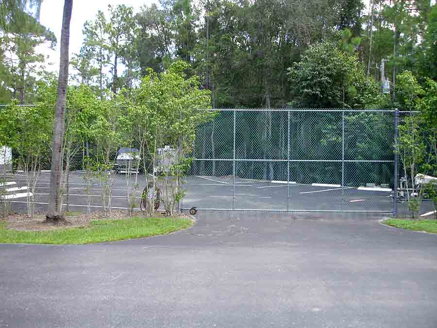 WOODMERE LAKE CLUB Fenced in Parking Lot for Boats and Trailers